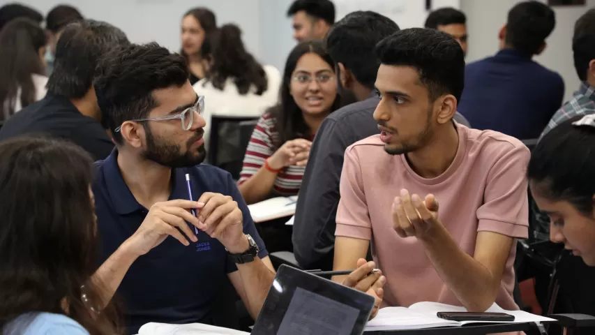 Students discussing case solutions